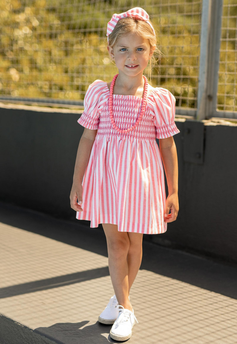 Conjunto para niña. Camiseta blanca y braguita de rayas rosa